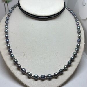 8mm and 3mm freshwater pearl necklace with sterling silver clasp. 22”